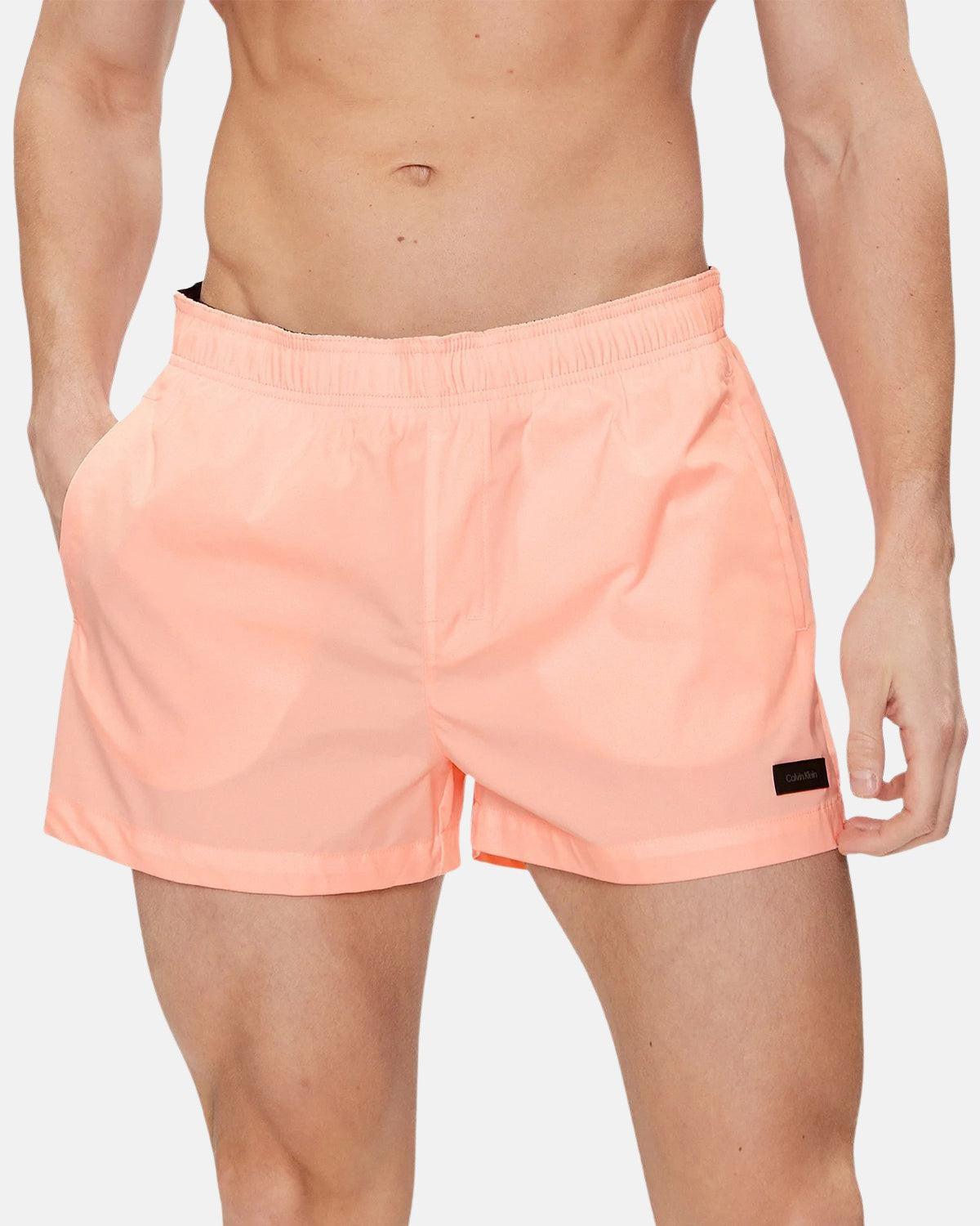 CALVIN KLEIN TAG LOGO SWIM SHORTS PINK - CALVIN-KLEIN-KM0KM00941-U03-S - northern threads uk