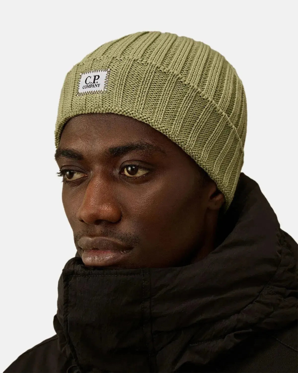 CP COMPANY-CP COMPANY EXTRA FINE MERINO WOOL LOGO BEANIE TEA GREEN-NORTHERN THREADS DESIGNER MENSWEAR